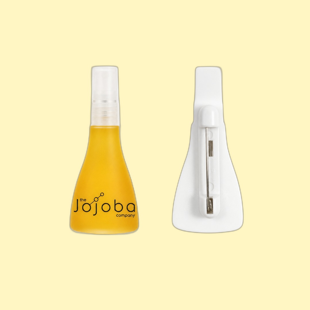 The Jojoba Company Jojoba-bottle lapel pin produced by Sense2